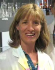 Close-up of Joy Phillips in labcoat