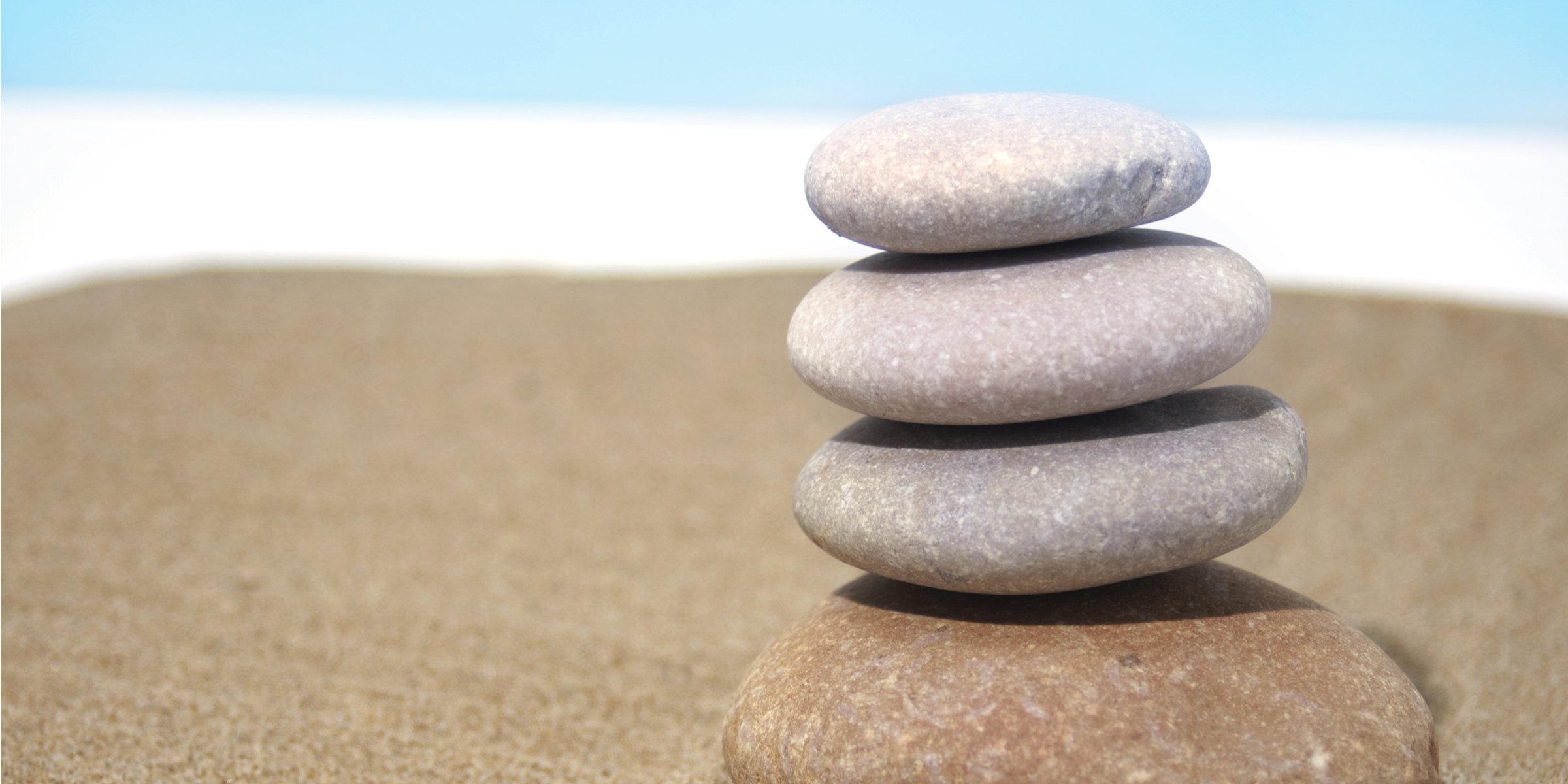 zen stones at the beach